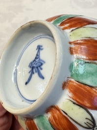 Seven Chinese famille verte cups and four saucers, conch shell and lingzhi marks, Kangxi