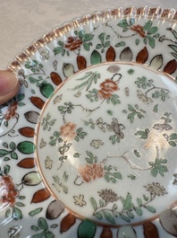 Seven Chinese famille verte cups and four saucers, conch shell and lingzhi marks, Kangxi