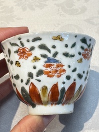 Seven Chinese famille verte cups and four saucers, conch shell and lingzhi marks, Kangxi