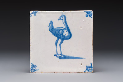 15 blue and white Dutch Delft tiles with large birds, 17th C.