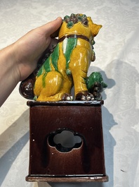 A pair of Chinese sancai-glazed Buddhist lions, Kangxi mark, 19th C.