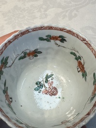 Seven Chinese famille verte cups and four saucers, conch shell and lingzhi marks, Kangxi