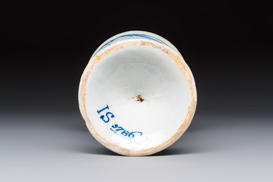 A blue and white inscribed Dutch Delft children's money bank, dated 1786