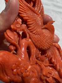 A Chinese carved red coral 'Birds and Flowers' group on a wooden stand, 19/20th C.