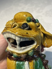 A pair of Chinese sancai-glazed Buddhist lions, Kangxi mark, 19th C.