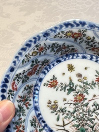 Seven Chinese famille verte cups and four saucers, conch shell and lingzhi marks, Kangxi
