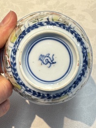 Seven Chinese famille verte cups and four saucers, conch shell and lingzhi marks, Kangxi
