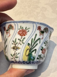 Seven Chinese famille verte cups and four saucers, conch shell and lingzhi marks, Kangxi