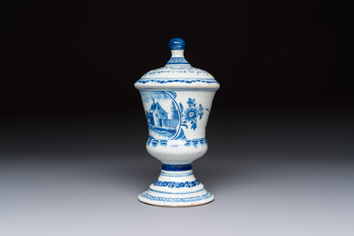 A blue and white inscribed Dutch Delft children's money bank, dated 1786
