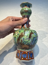 A pair of clobbered Dutch Delft vases, 17th C.