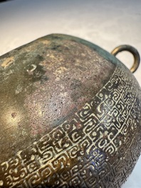 A Chinese archaic bronze two-handled cup with 'Leiwen' design, late Spring and Autumn period