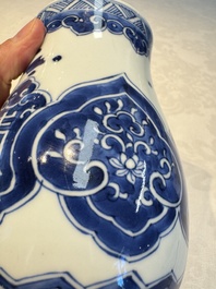 A Chinese blue and white covered vase and two bottle vases, Chenghua and jade marks, Kangxi