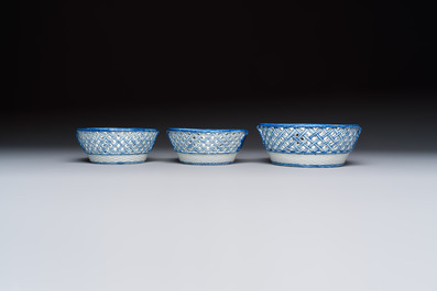 Six Chinese blue and white reticulated baskets with pagodas along a river, Qianlong