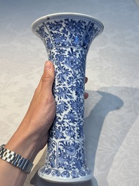 A Chinese blue and white five-piece garniture with floral design, Kangxi