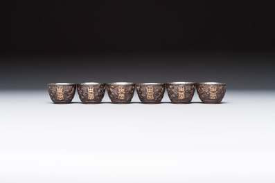 A group of 12 Chinese silver-lined coconut 'Shou 壽' bowls and cups, Wang Hengxin 王恆馨 marks, 19/20th C.