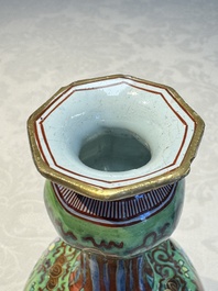 A pair of clobbered Dutch Delft vases, 17th C.