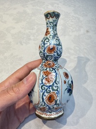 Three polychrome Dutch Delft cashmere palette bottle vases, first quarter 18th C.