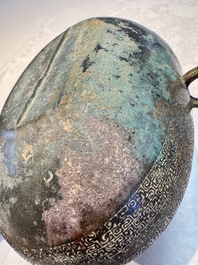 A Chinese archaic bronze two-handled cup with 'Leiwen' design, late Spring and Autumn period