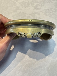 A Chinese bronze handled censer and stand, 17/18th C.