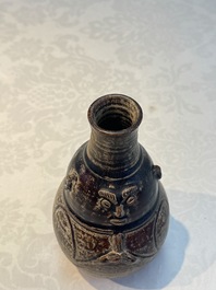 Three khmer-style brown-glazed anthropomorphic gourd-form bottles, probably 12/13th C.