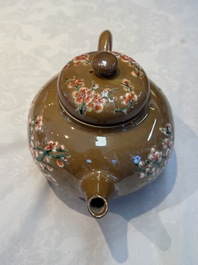 A large Chinese famille verte capucin-ground 'Prunus Blossoms' teapot and cover with relief design, Kangxi