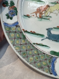A Chinese famille verte 'Eight Horses' plate, Kangxi