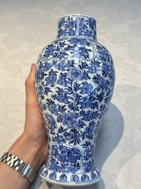 A Chinese blue and white five-piece garniture with floral design, Kangxi