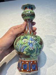 A pair of clobbered Dutch Delft vases, 17th C.
