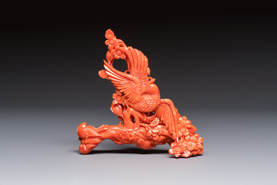 A Chinese carved red coral 'Birds and Flowers' group on a wooden stand, 19/20th C.
