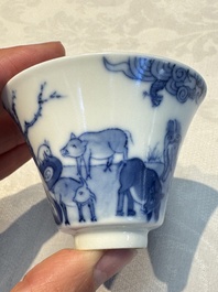 A pair of Chinese blue and white 'Bleu de Hue' cups with zodiac animals, Noi Phu 內府 mark, 19th C.
