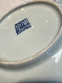 Four Chinese famille rose saucers and a gilt-decorated powder-blue-ground saucer, Qianlong and Jiaqing marks, 18/19th C.