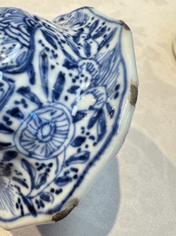 A Chinese blue and white five-piece garniture with floral design, Kangxi