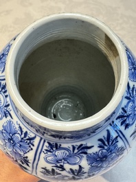 A Chinese blue and white five-piece garniture with floral design, Kangxi