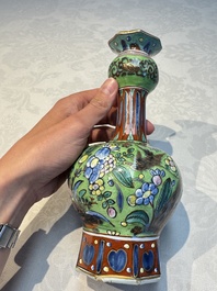 A pair of clobbered Dutch Delft vases, 17th C.