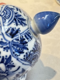 A Chinese blue and white five-piece garniture with floral design, Kangxi