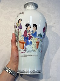 A pair of Chinese famille rose 'Meiping' vases with elegant beauties in a garden, Qianlong mark, 20th C.