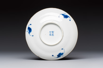 A Chinese blue and white 'Buddhist Lion' teapot, covered bowl and a saucer, various marks, 19th C.