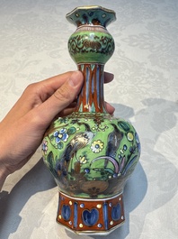 A pair of clobbered Dutch Delft vases, 17th C.