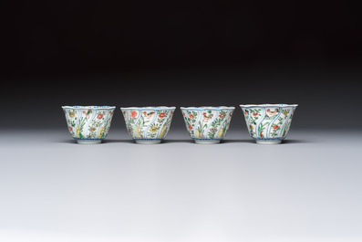 Seven Chinese famille verte cups and four saucers, conch shell and lingzhi marks, Kangxi