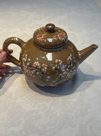 A large Chinese famille verte capucin-ground 'Prunus Blossoms' teapot and cover with relief design, Kangxi