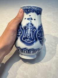 A Chinese blue and white covered vase and two bottle vases, Chenghua and jade marks, Kangxi