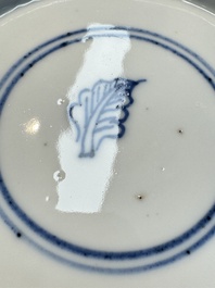 A pair of Chinese blue and white 'Sense of Smell' saucer dishes, artemisia leaf mark, Kangxi