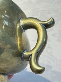A Chinese bronze handled censer and stand, 17/18th C.