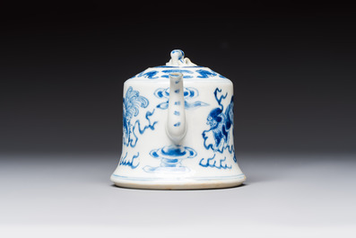 A Chinese blue and white 'Buddhist Lion' teapot, covered bowl and a saucer, various marks, 19th C.