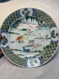 A Chinese famille verte 'Eight Horses' plate, Kangxi