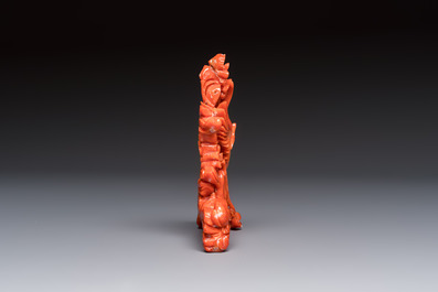 A Chinese carved red coral 'Birds and Flowers' group on a wooden stand, 19/20th C.