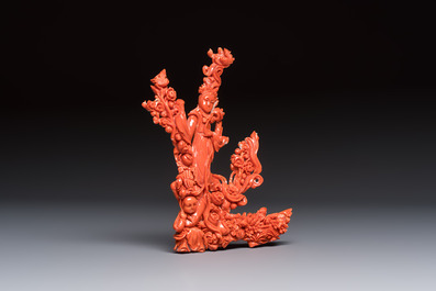 A Chinese carved red coral 'Goddess and Boy' group, 19/20th C.