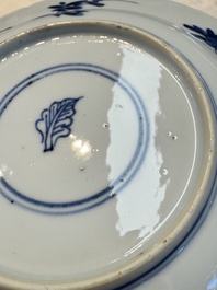 A pair of Chinese blue and white 'Sense of Smell' saucer dishes, artemisia leaf mark, Kangxi
