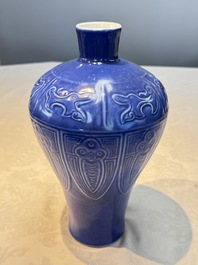 A Chinese archaistic blue-glazed vase with relief design, 20th C.