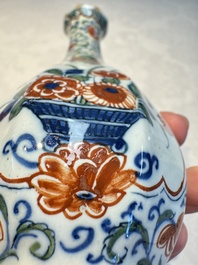 Three polychrome Dutch Delft cashmere palette bottle vases, first quarter 18th C.